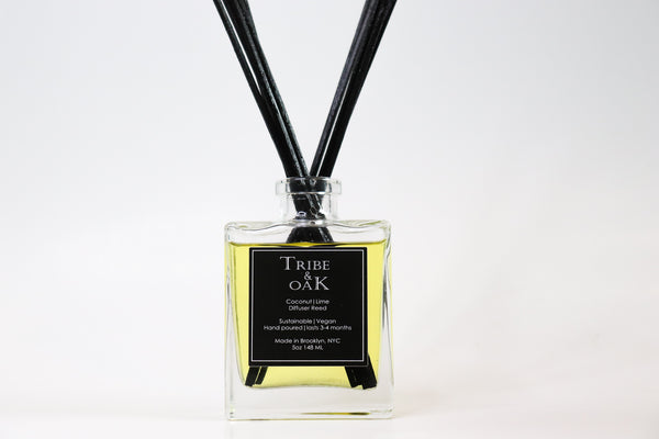 Glass bottle with dark yellow diffuser liquid